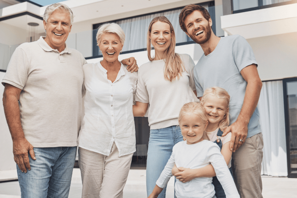 Big family, senior people and child backyard at luxury house, property or real estate in happy group portrait.